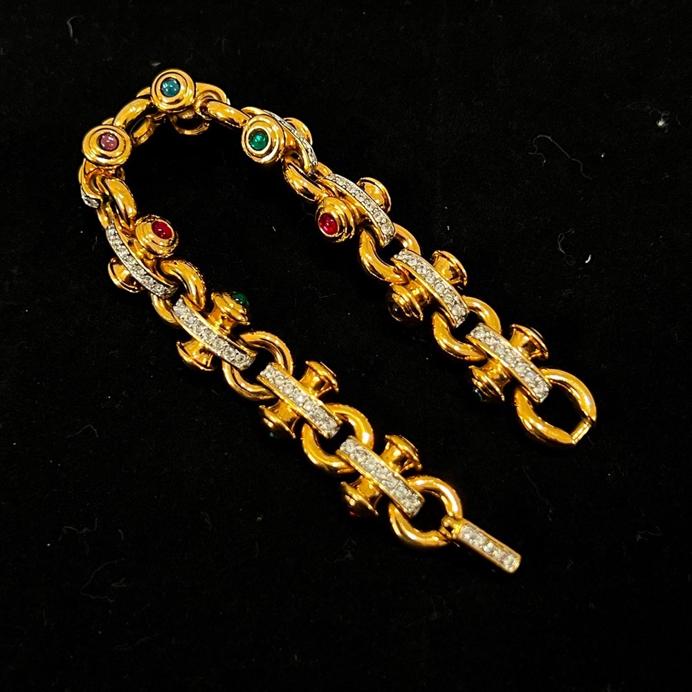 Swarovski brand signed bracelet multicolored and clear crystals in gold setting